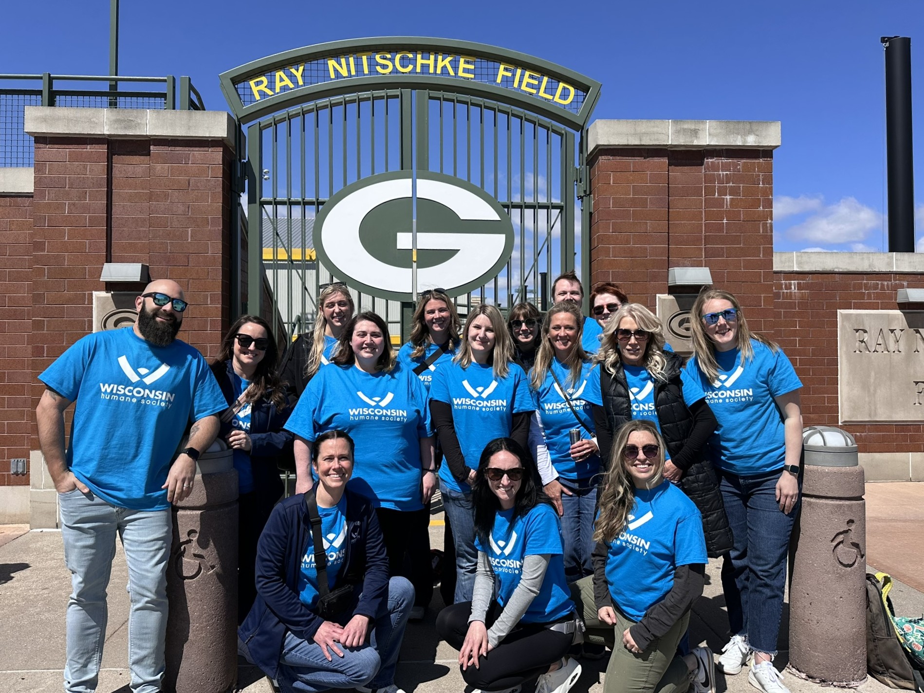 WHS staff gathered at the Green Bay Packers Ray Nitschke Field